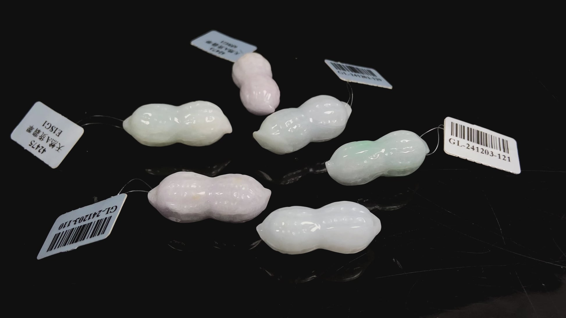  Luminous milky white peanut loose jadeite.