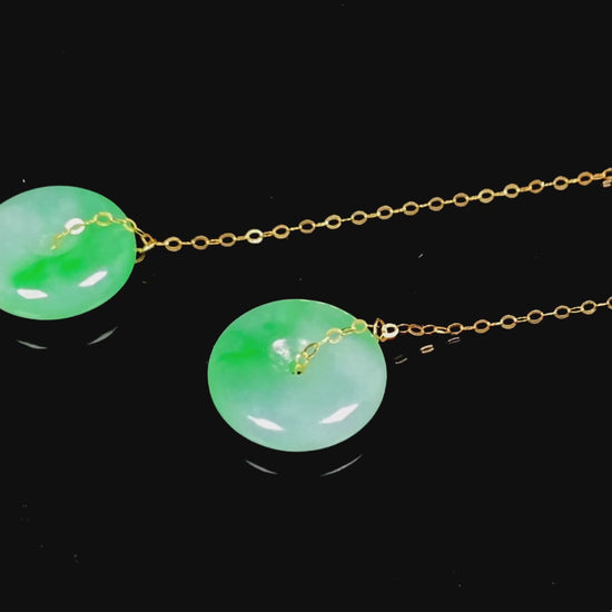 A peaceful green Ping An Kou jadeite earring.