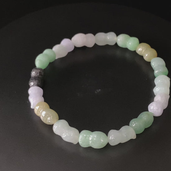A multi color peanut jadeite beads bracelet.