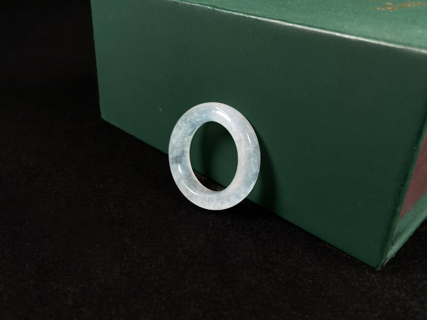 An icy-colored jadeite ring.