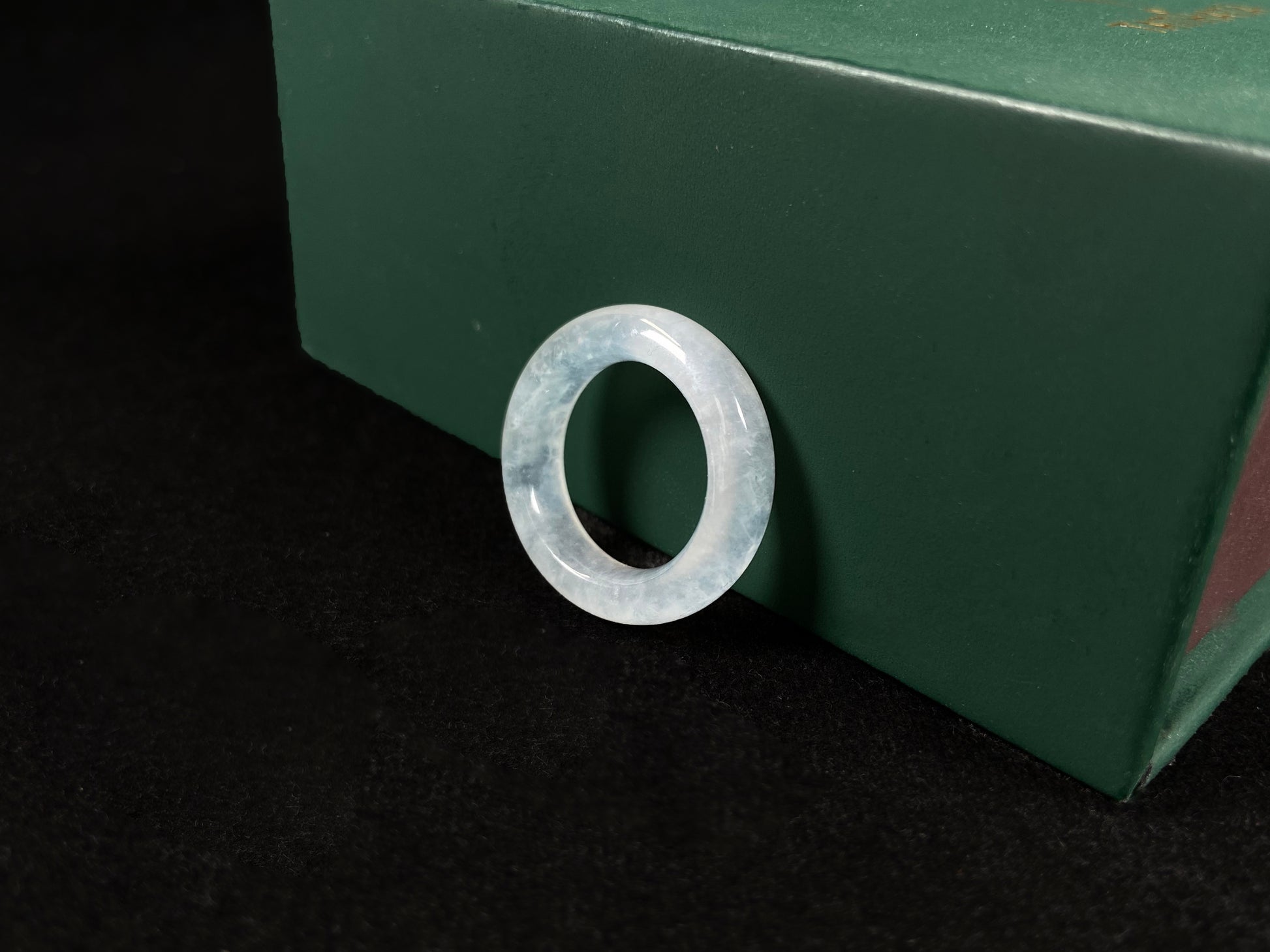 An icy-colored jadeite ring.