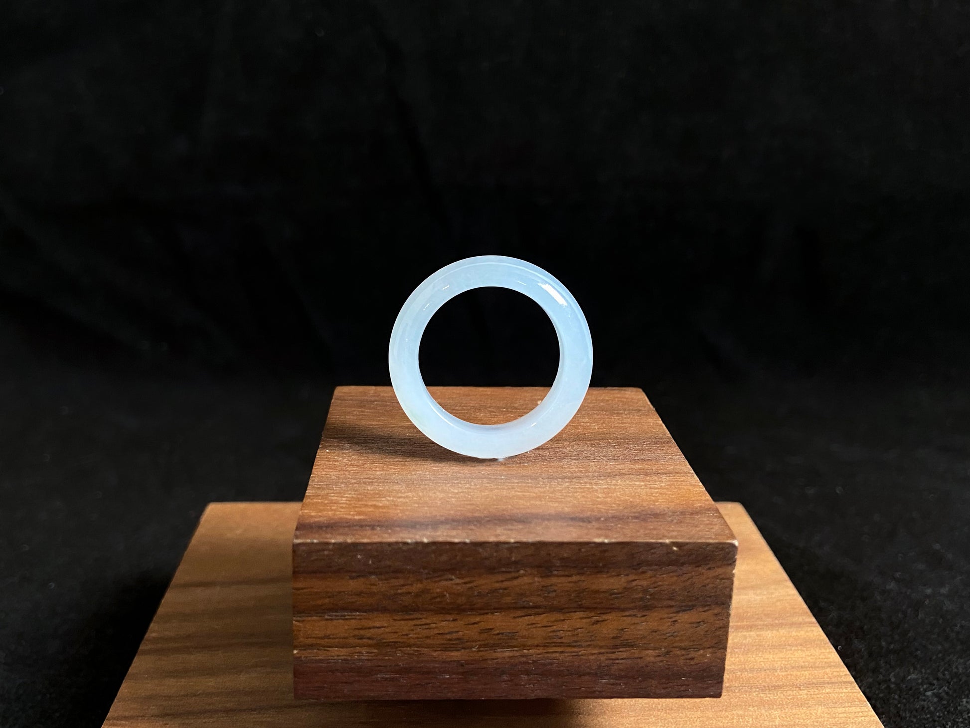 This jade ring features exceptional transparency with high quality water like clarity.