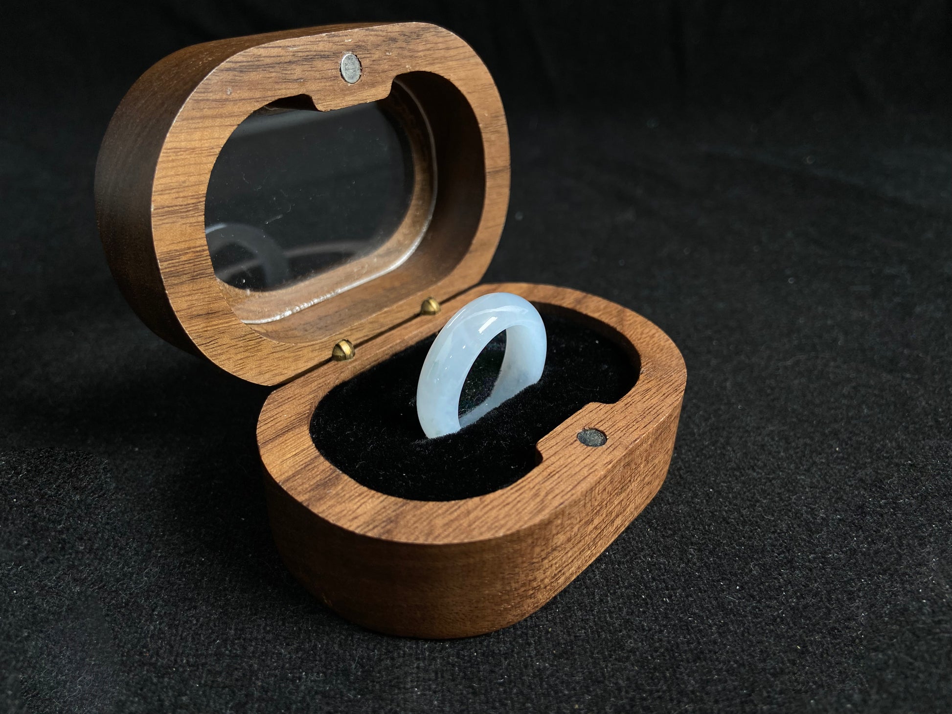 This jade ring features exceptional transparency with high quality water like clarity.