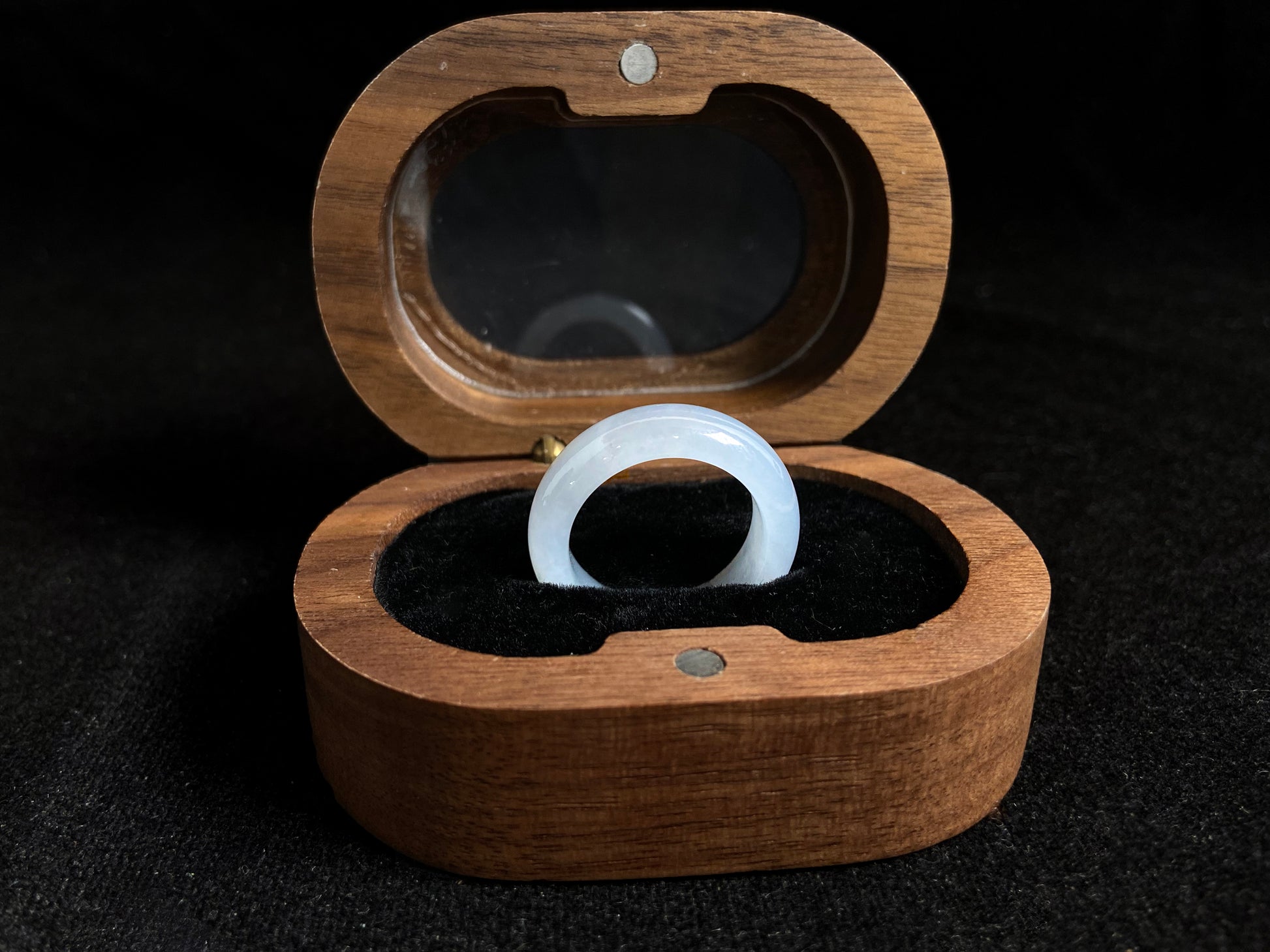 This jade ring features exceptional transparency with high quality water like clarity.