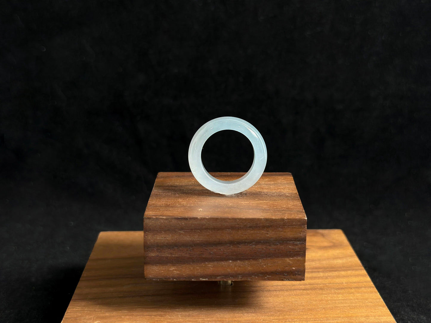 This elegant ring features a white icy jadeite with crystal clear transparency and frost like luminosity.