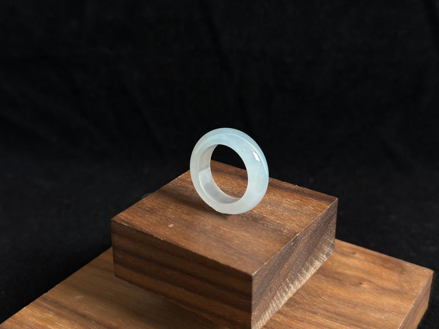 This elegant ring features a white icy jadeite with crystal clear transparency and frost like luminosity.