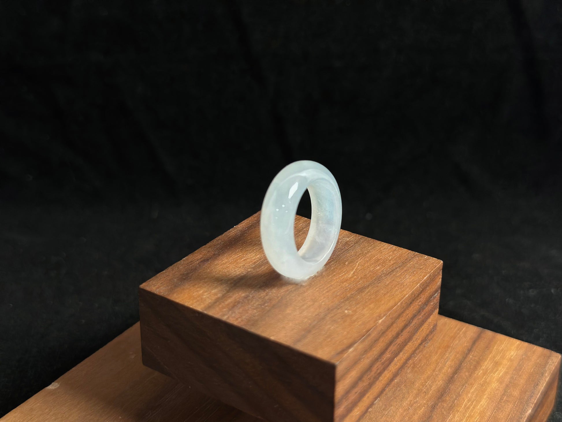 This elegant ring features a white icy jadeite with crystal clear transparency and frost like luminosity.