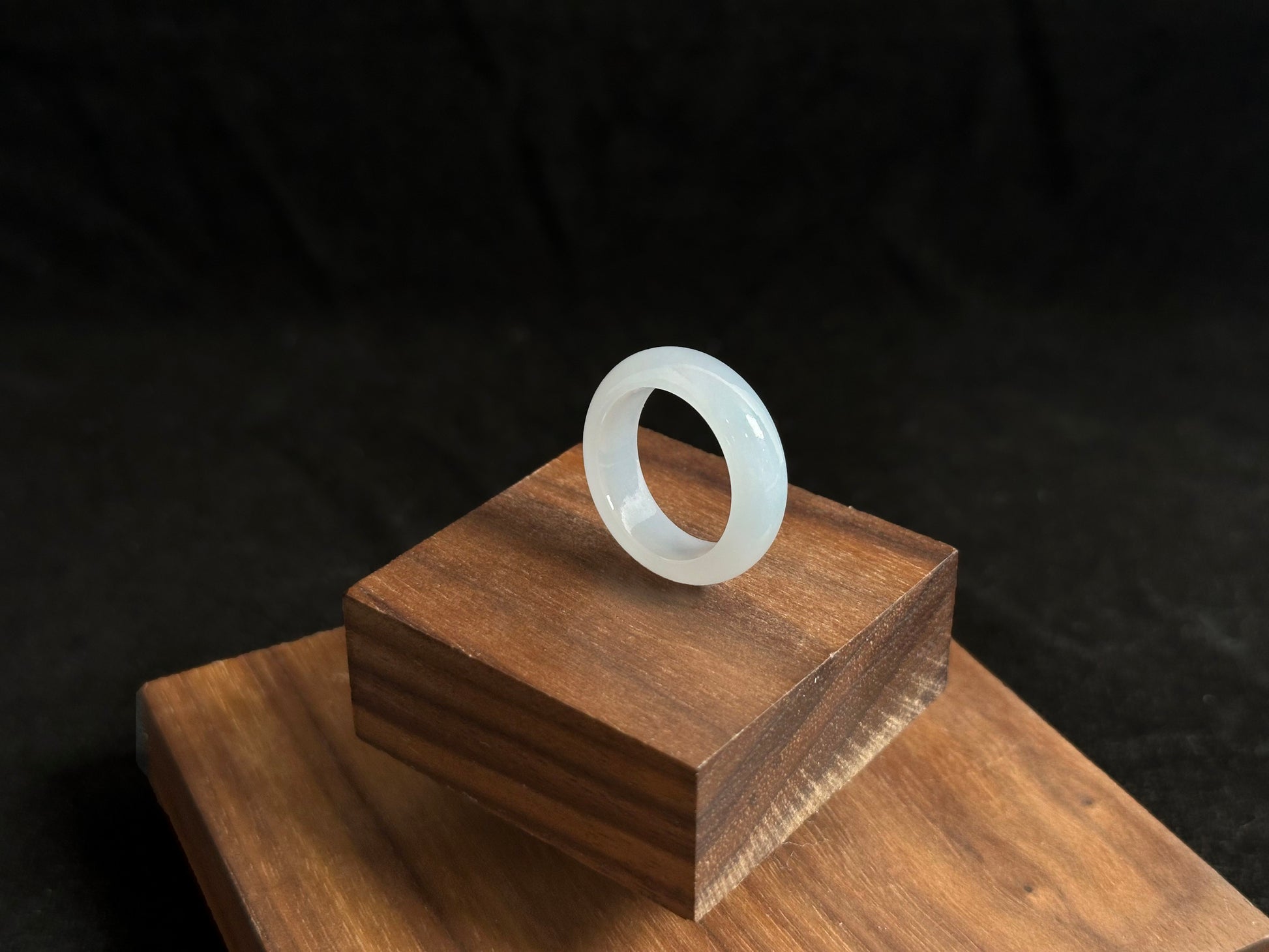 This elegant ring features a white icy jadeite with crystal clear transparency and frost like luminosity.