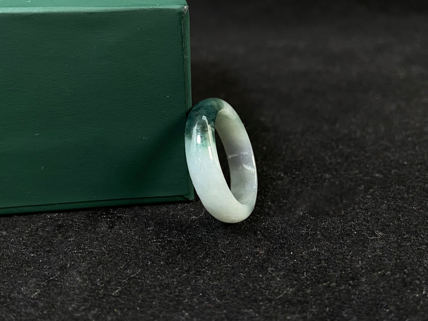 This elegant ring combines milky white jade with rich green accents.