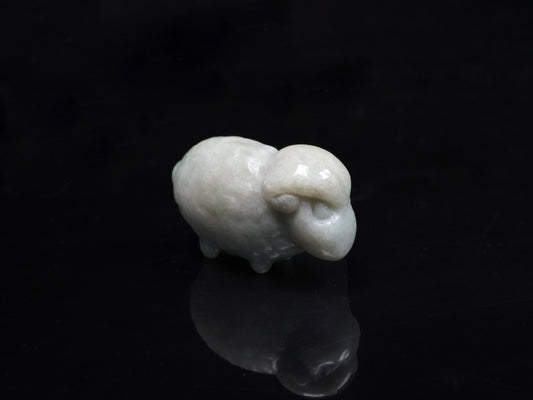 A soft ivory white sheep loose jadeite.